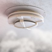 Image of fire detector with smoke. 