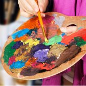 Image of paint brush and palette of paint.