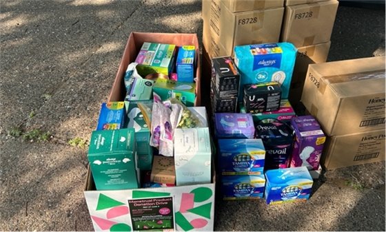 A pile of collected donations of female hygiene products