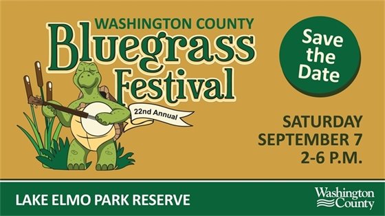 Promotional banner for the 22nd Annual Washington County Bluegrass Festival. Features an illustration of a turtle playing a banjo in front of a green background. Text on the banner reads: "Washington County Bluegrass Festival, Save the Date, Saturday September 7, 2-6 P.M. at Lake Elmo Park Reserve." The background is olive green with additional yellow and orange elements.
