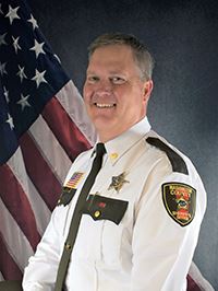 Portrait of Commander Kyle Schenck in uniform